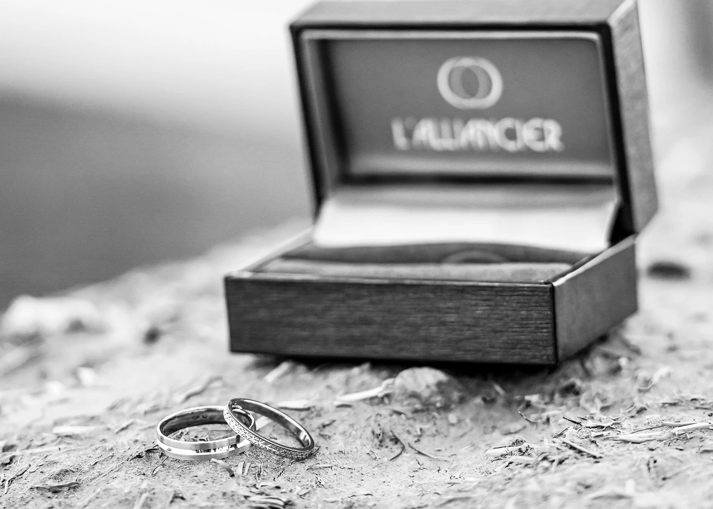 Wedding rings in their presentation box — original black-and-white edit